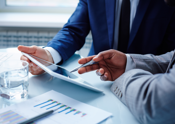 A man in a blue suit accesses his cloud based document storage, perfect for his business.