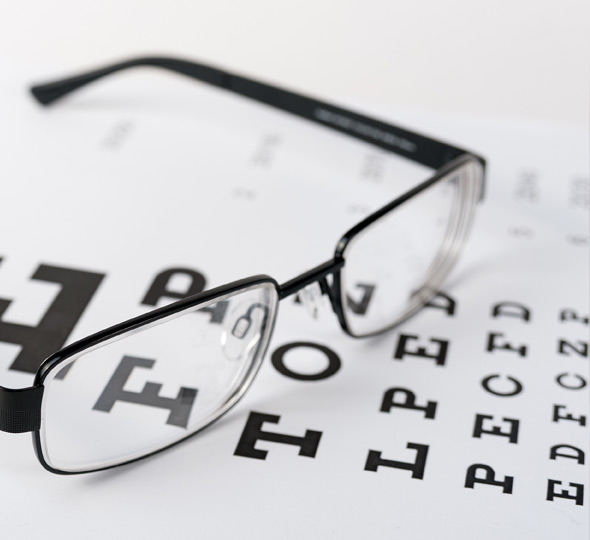A pair of glasses resting on a chart.